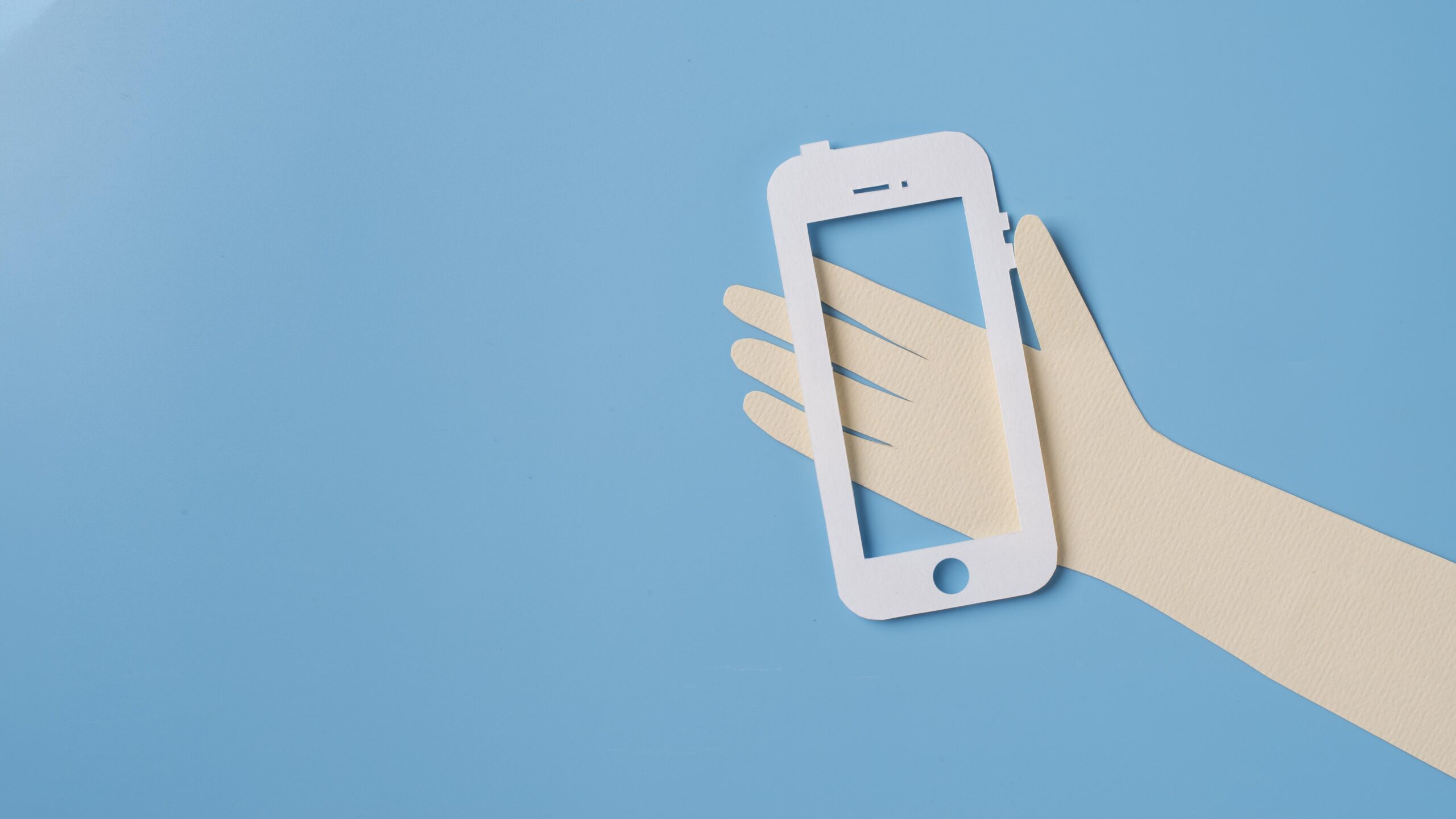 social-media-concept-with-hand-holding-phone